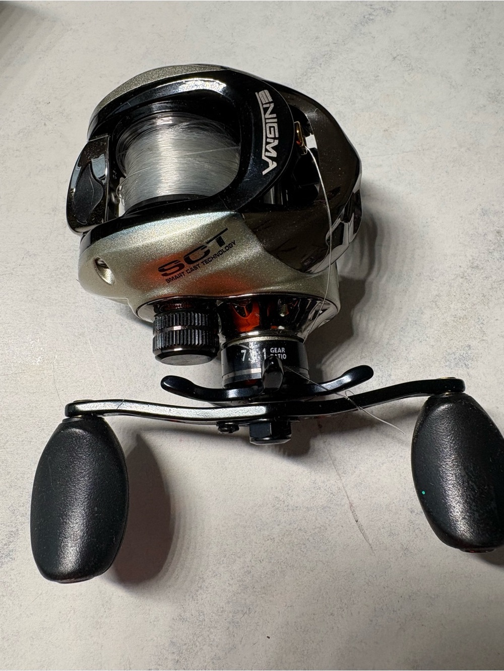 Bass Pro Shops Enigma Smart Cast Reel - Black and Gold - Picture 5 of 10